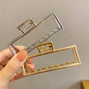 Garra de cabelo metálica